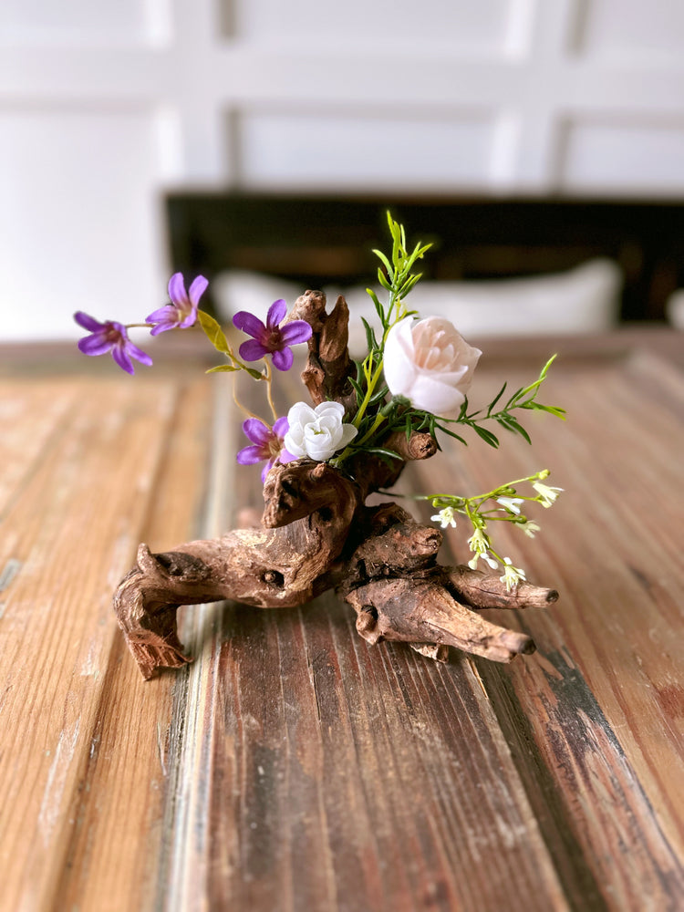 Natural Driftwood Centerpiece with Purple and White Flowers
