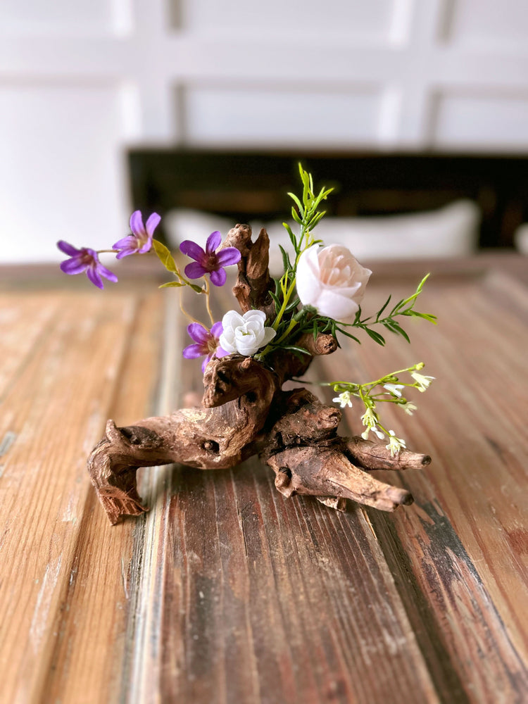 Natural Driftwood Centerpiece with Purple and White Flowers
