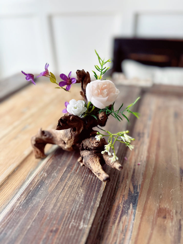 Natural Driftwood Centerpiece with Purple and White Flowers