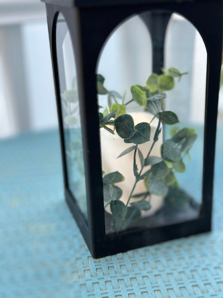 Solar Powered Black Lantern with Faux Candle and Artificial Eucalyptus