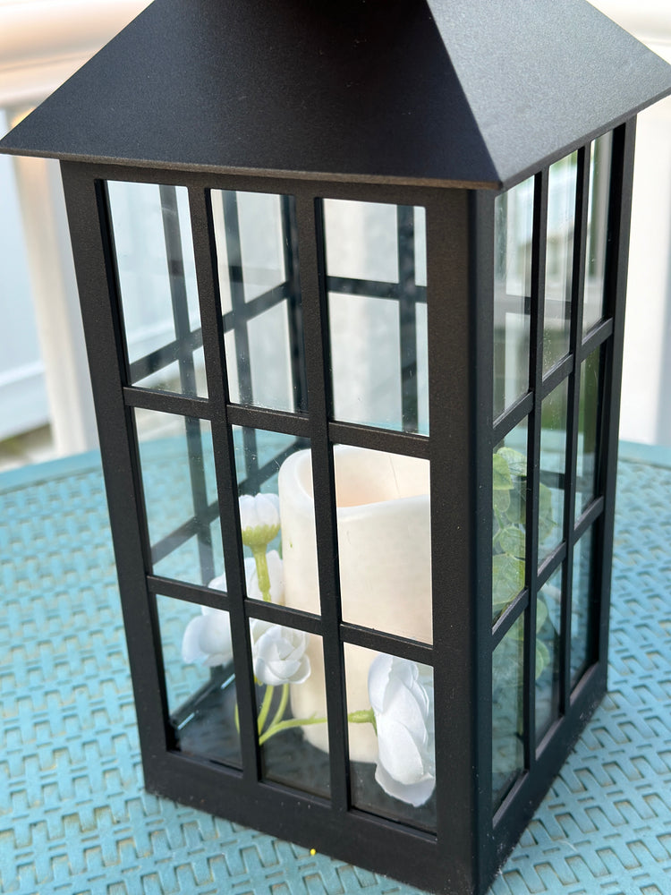 Solar Powered Black Lantern with Faux Candle and White Artificial Flowers