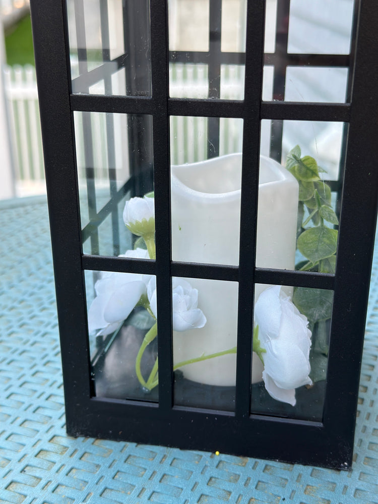 Solar Powered Black Lantern with Faux Candle and White Artificial Flowers