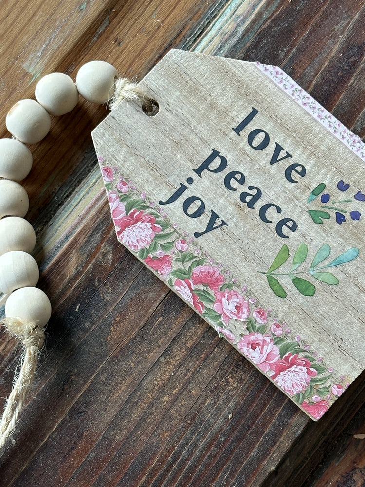 "Love Peace Joy" Botanical Wooden Tag with Beaded String