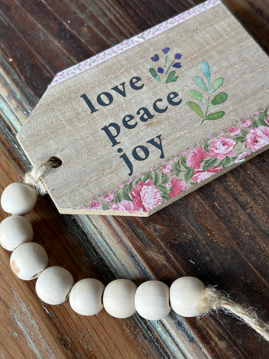 "Love Peace Joy" Botanical Wooden Tag with Beaded String