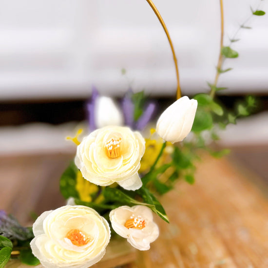 Double Golden Ring Tabletop Floral Arrangement.