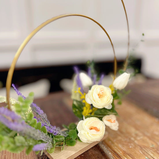 Double Golden Ring Tabletop Floral Arrangement.