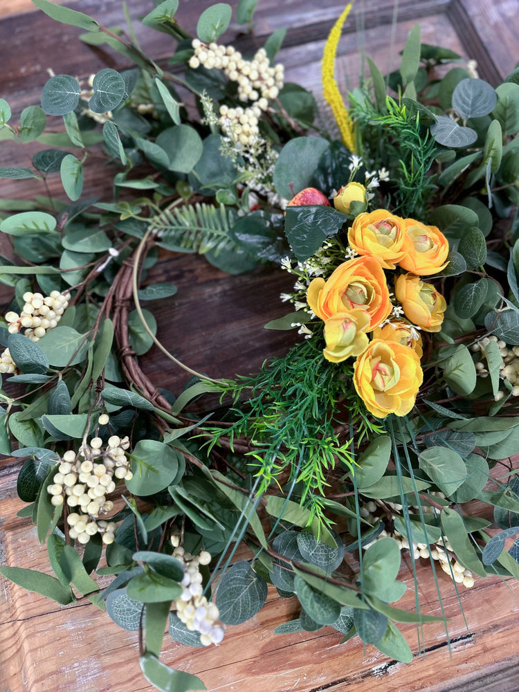 Vibrant Yellow Spring Wildflower and Ranunculus Wreath