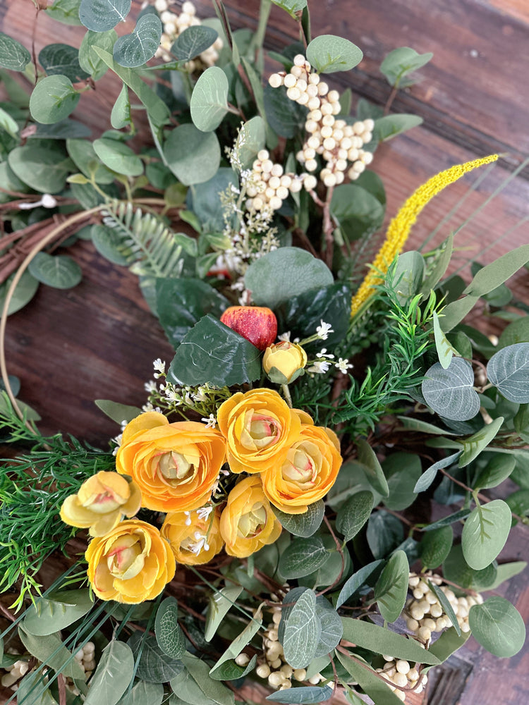 Vibrant Yellow Spring Wildflower and Ranunculus Wreath