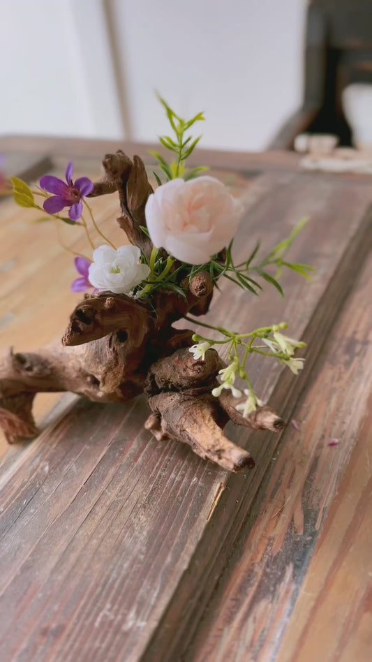 Natural Driftwood Centerpiece with Purple and White Flowers