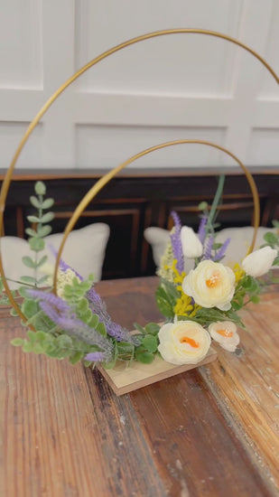 Double Golden Ring Tabletop Floral Arrangement.