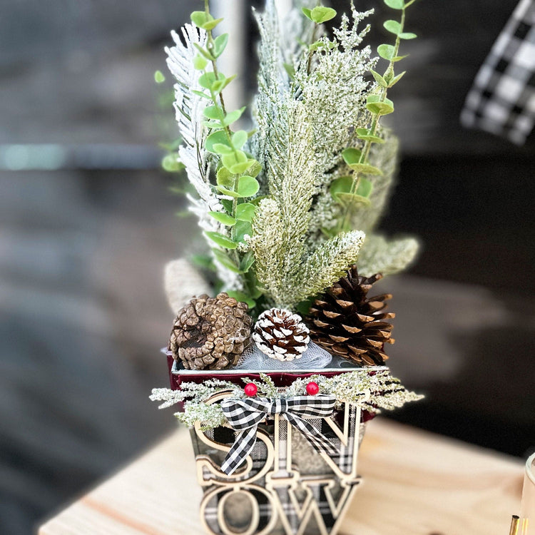 Snow-Themed Holiday Tabletop Arrangement.